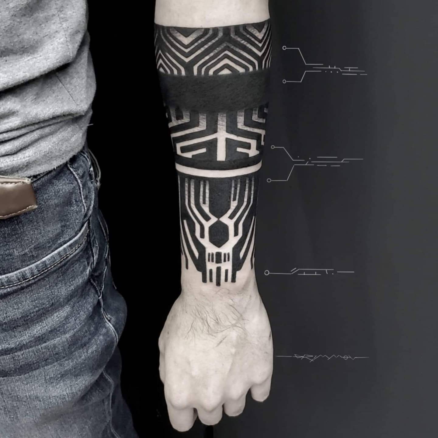 Bold cyberpunk tattoo on forearm featuring geometric patterns and solid black bands